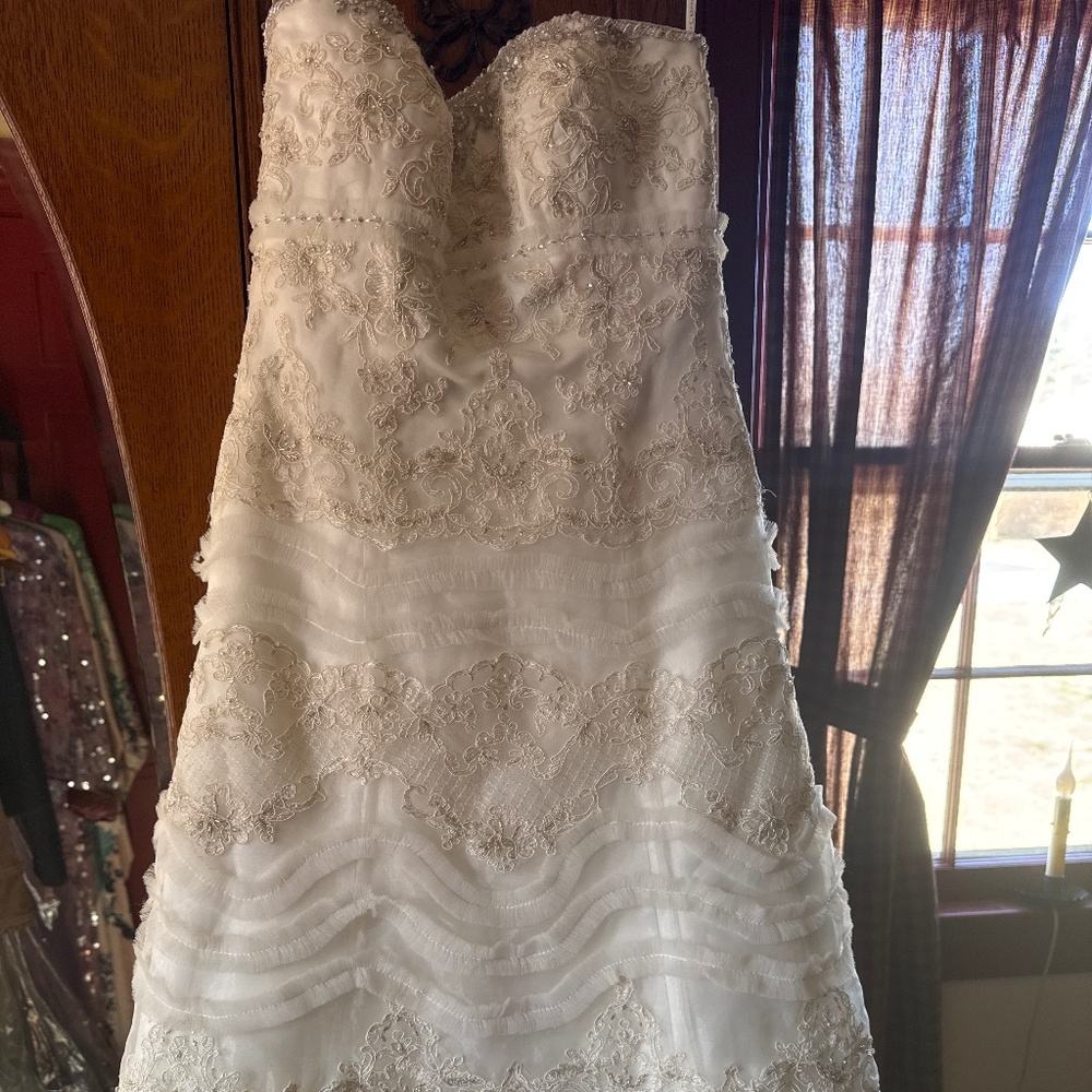 Oleg Cassini ivory strapless, lace wedding gown